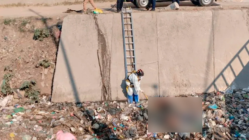 Encuentran restos humanos en canal de aguas negras de Ecatepec